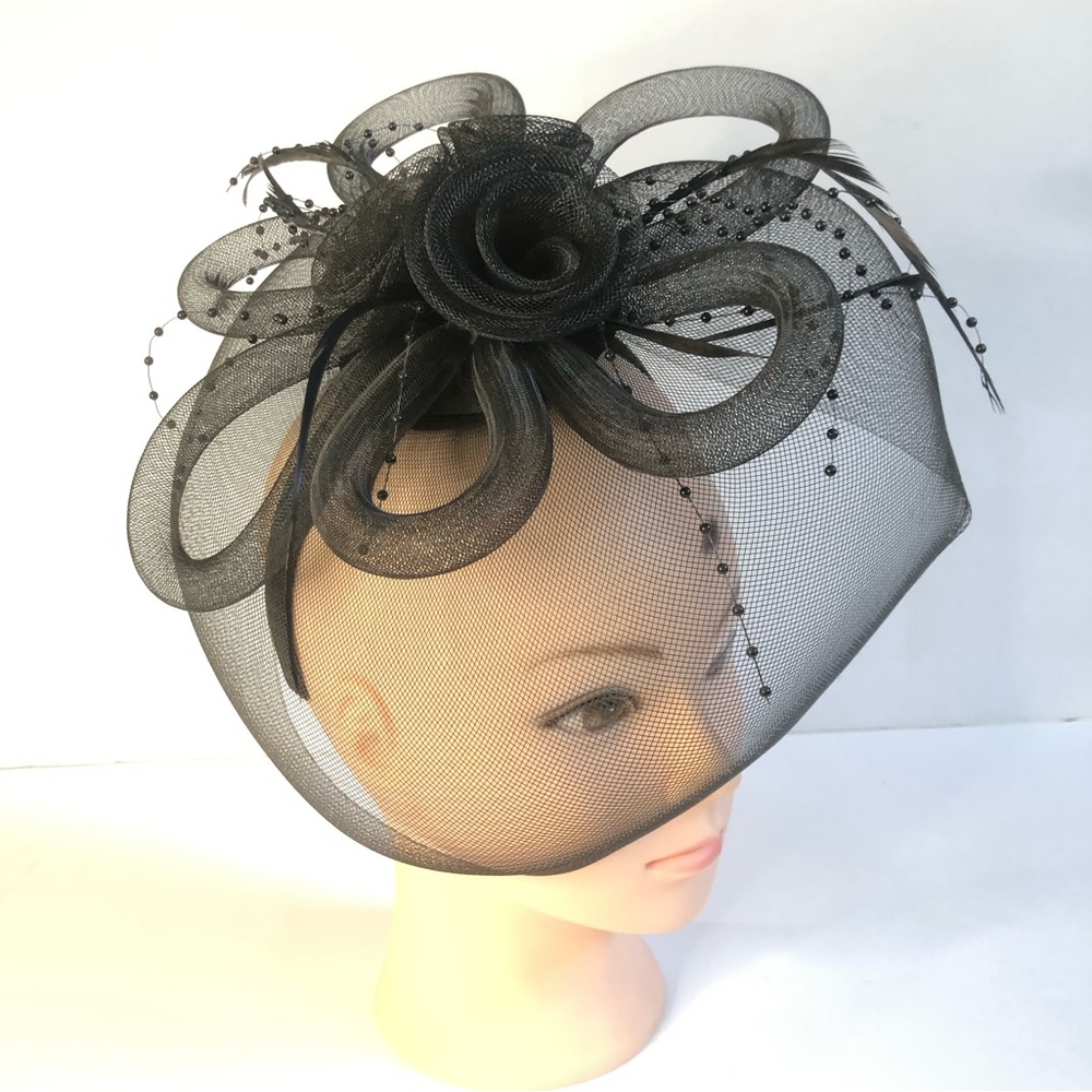 Woman’s black headband fascinator hat